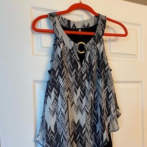 Women’s dressy tank asymmetrical pattern .